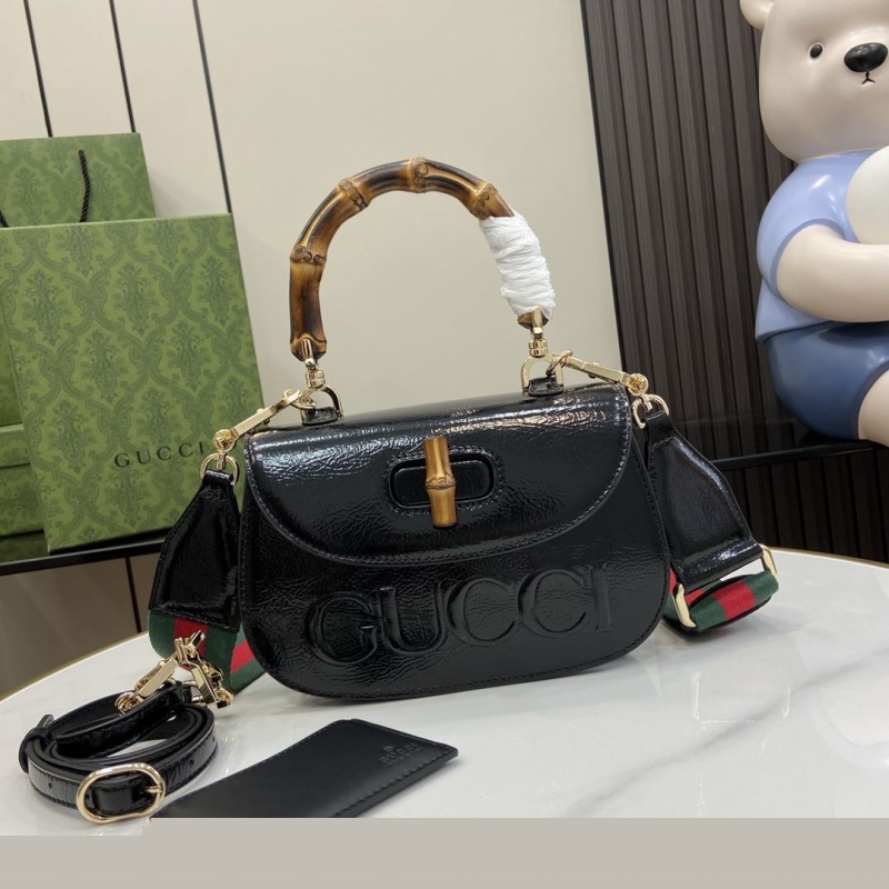 G*u*i top handle bags